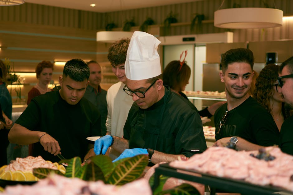 Expert catering team demonstrating professional pizza-making techniques
